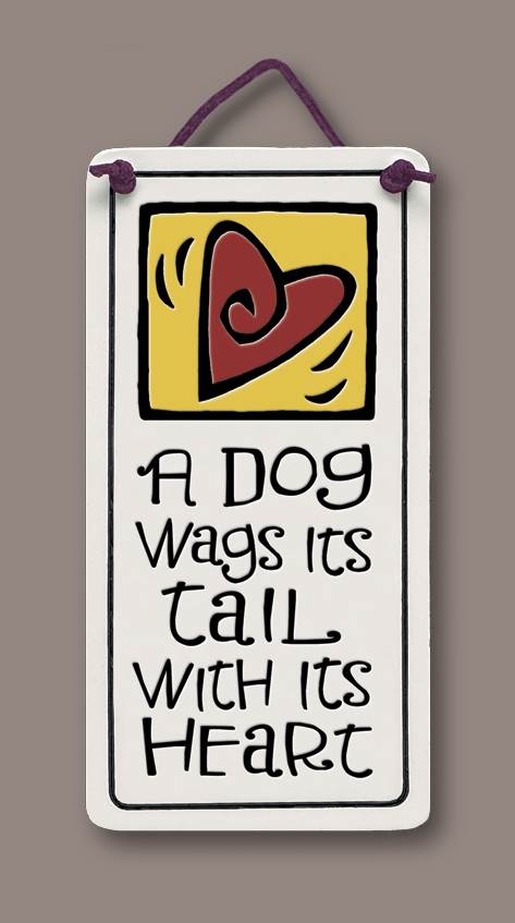 A dog wags it's tail...